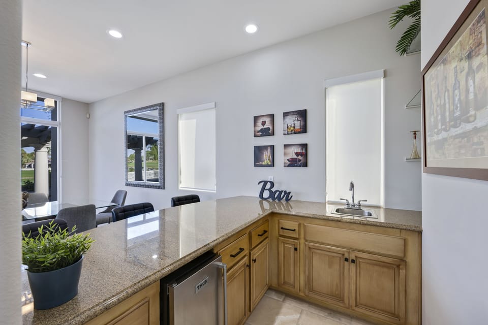 Wet bar complete with ice maker and beverage refrigerator