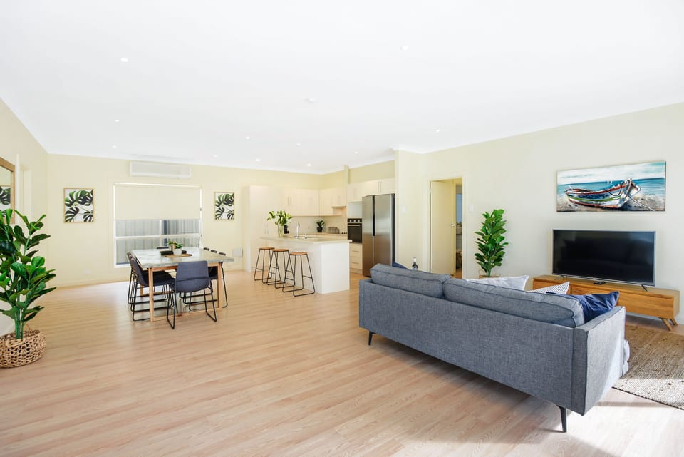Family House, 4 Bedrooms, Non Smoking | Living area | 22-inch flat-screen TV with digital channels, TV, DVD player