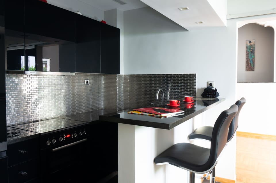 Sleek design kitchen and breakfast bar