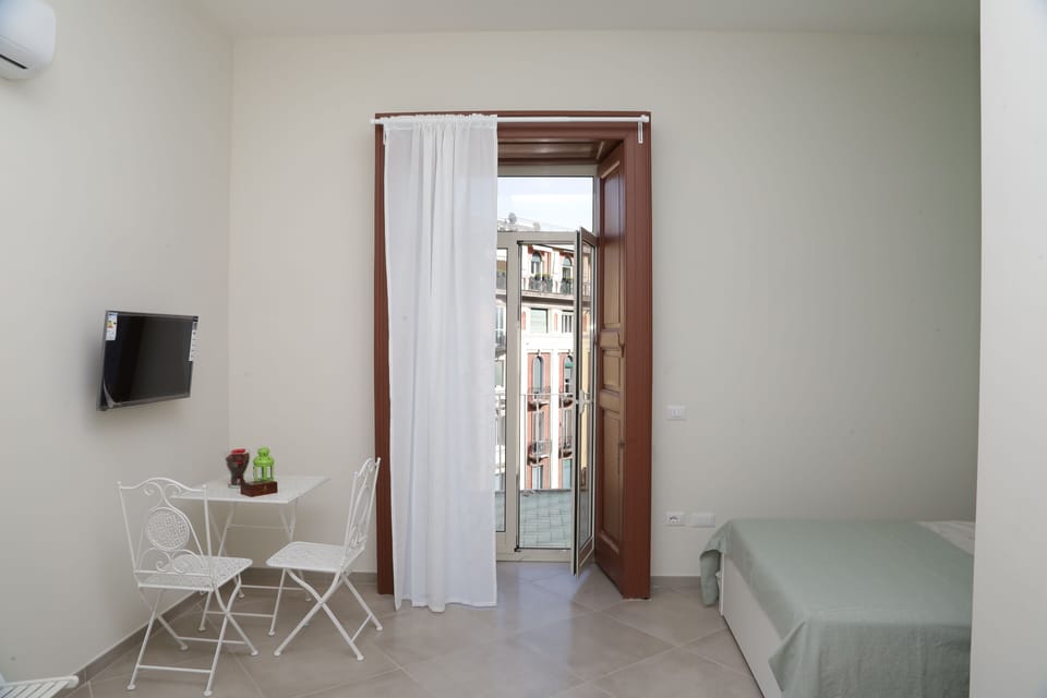 Standard Triple Room, Sea View | Blackout drapes, soundproofing, free WiFi, bed sheets