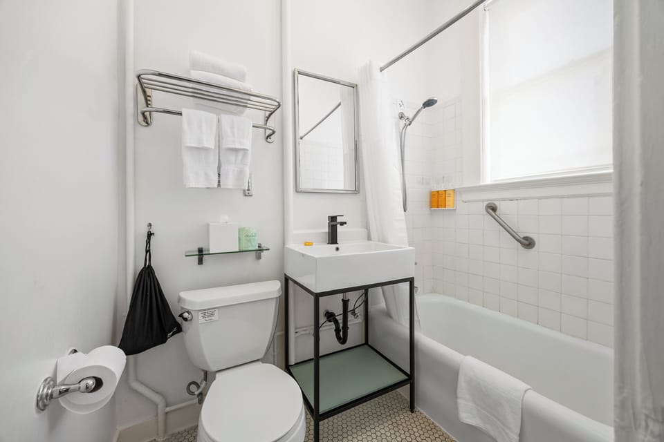 Suite | Bathroom | Eco-friendly toiletries, hair dryer, towels