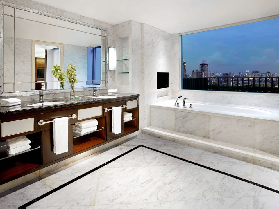 Separate tub and shower, free toiletries, hair dryer, slippers