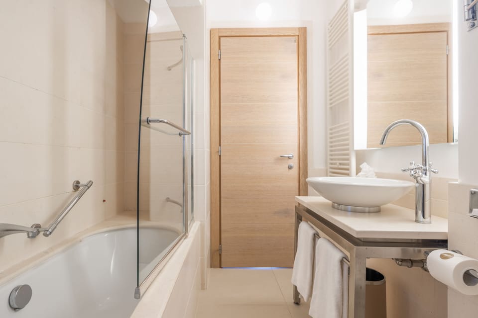 Suite, Sea View (Penthouse) | Bathroom | Rainfall showerhead, free toiletries, hair dryer, bathrobes
