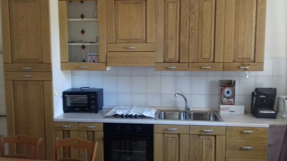 Microwave, griddle, toaster oven, cleaning supplies
