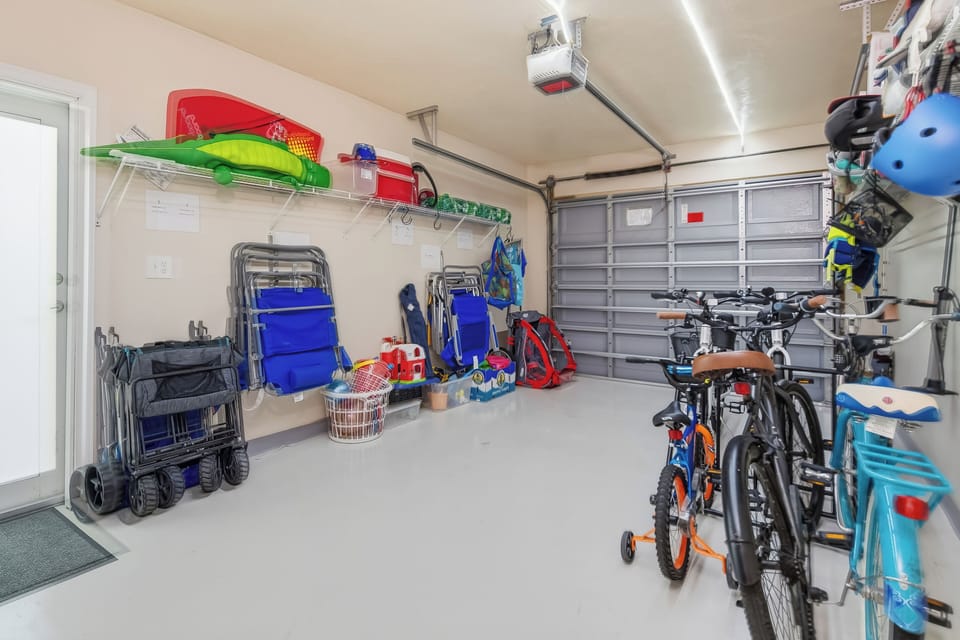 Garage with additional toys, baby equipment and beach accessories