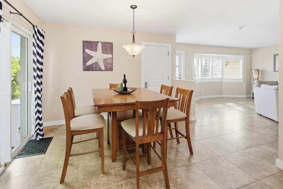 Dining area with sliding door and access to the garage