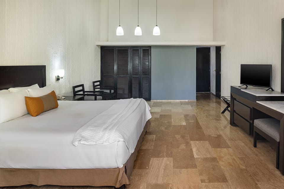 In-room safe, iron/ironing board (on request), bed sheets