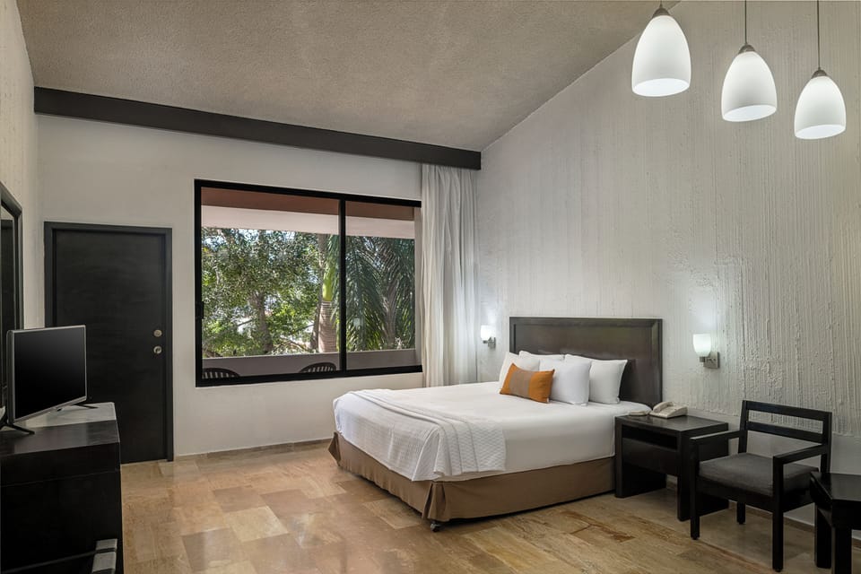 In-room safe, iron/ironing board (on request), bed sheets