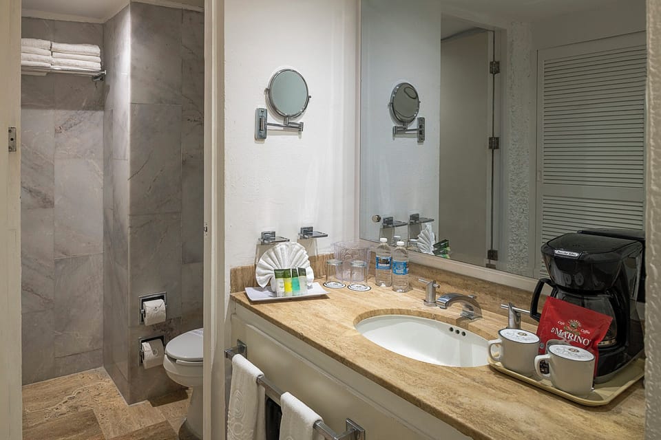 Shower, rainfall showerhead, designer toiletries, hair dryer