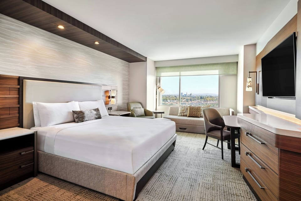 Premium bedding, down comforters, pillowtop beds, in-room safe