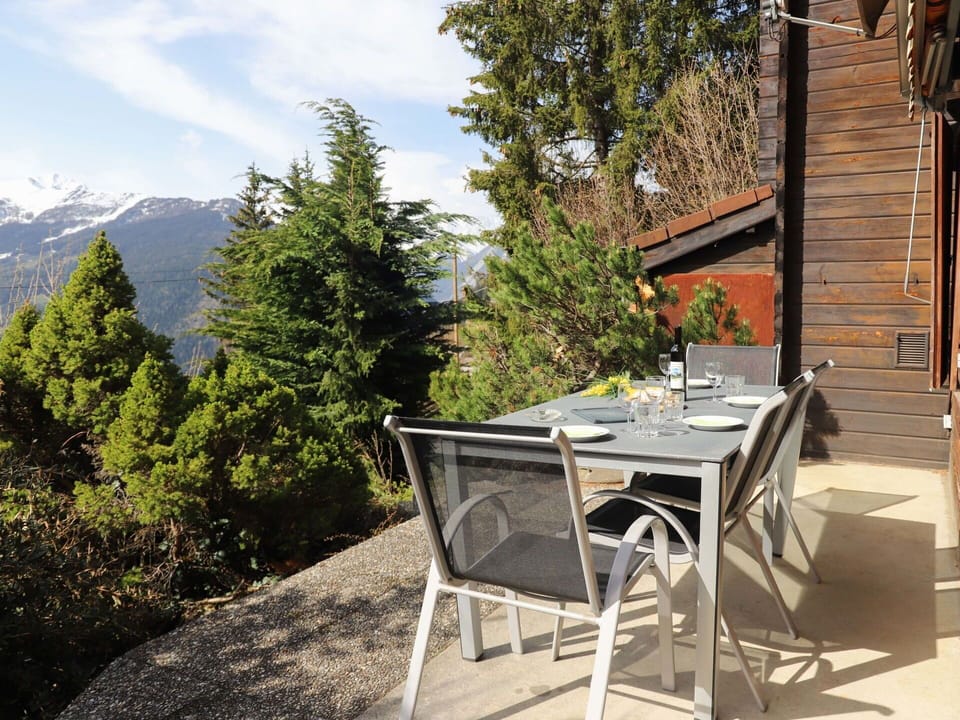 Plant, Cloud, Table, Building, Sky, Tree, Mountain, Outdoor Furniture, Outdoor Table, Wood