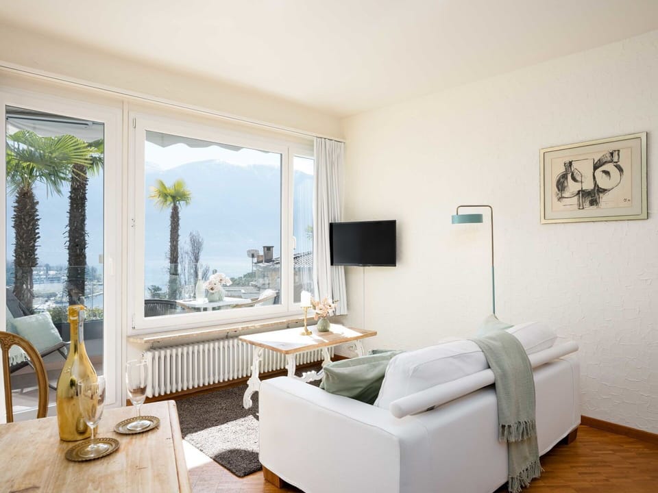 Furniture, Interior Design, Couch, Room, Living Room, Flooring, Floor, Lighting, Ceiling, Home