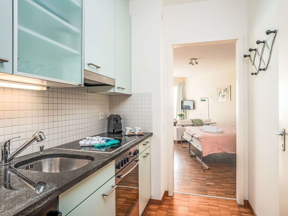 Furniture, Interior Design, Flooring, Floor, Ceiling, Major Appliance, Room, Kitchen Appliance, Kitchen, Countertop