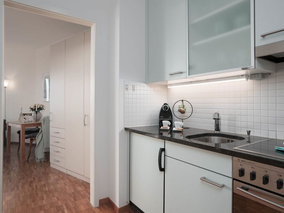 Kitchen, Countertop, Kitchen Appliance, Interior Design, Flooring, Major Appliance, Cabinetry, Wood, Furniture, Kitchen Sink
