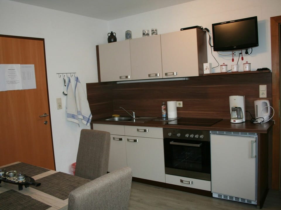 Cabinetry, Tap, Kitchen Sink, Sink, Countertop, Kitchen Stove, Plumbing Fixture, Kitchen Appliance, Home Appliance, Wood