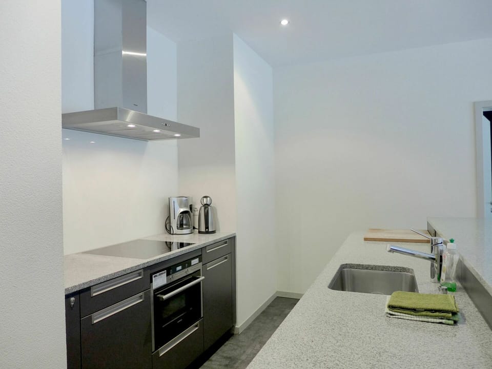 Cabinetry, Furniture, Countertop, Property, Building, Drawer, Lighting, Kitchen Stove, Kitchen, Interior Design