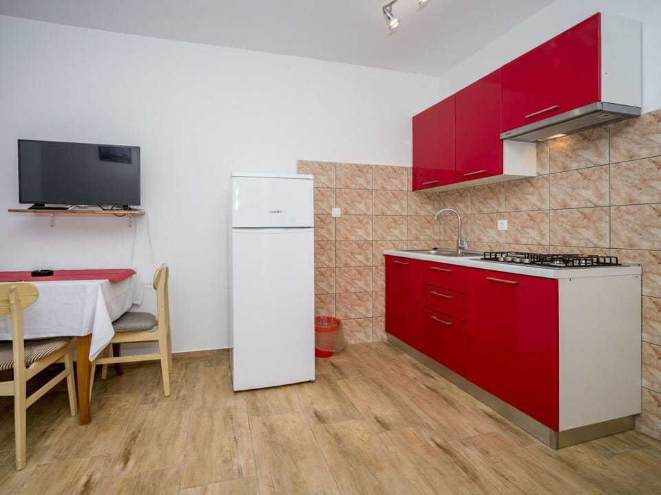 Room, Property, Red, Furniture, Floor, Interior Design, Building, House, Wall, Flooring