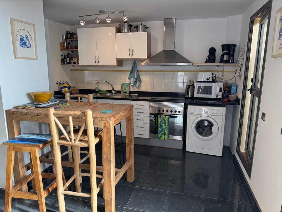 Kiitchen and indoor dining area
