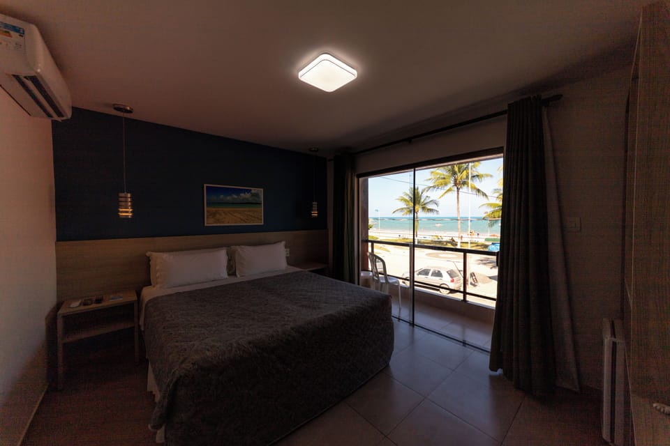 Double Room, Balcony, Beach View | Minibar, desk, blackout drapes, free WiFi