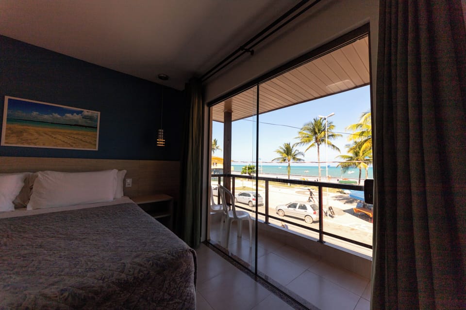 Double Room, Balcony, Beach View | Minibar, desk, blackout drapes, free WiFi