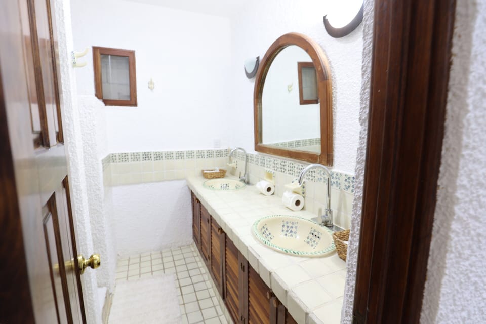 Bosque Caribe One Bedroom Apartment with Terrace | Bathroom | Towels, soap, shampoo, toilet paper