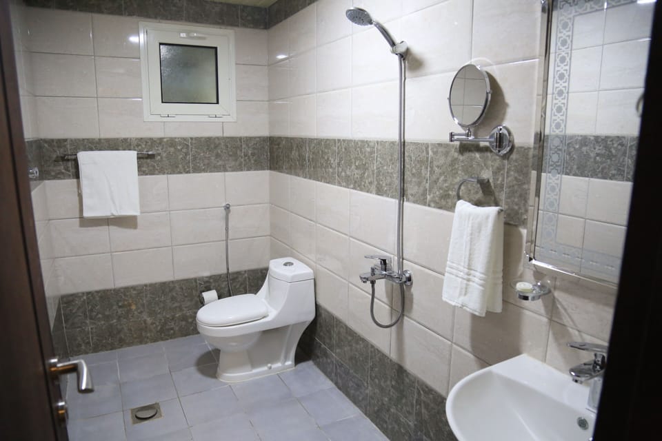 Superior Studio | Bathroom | Shower, slippers, bidet, towels