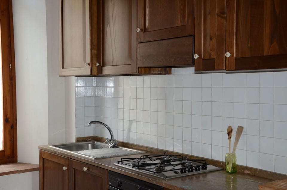 Countertop, Kitchen, Tile, Room, Property, Cabinetry, Furniture, Floor, Kitchen Sink, Sink