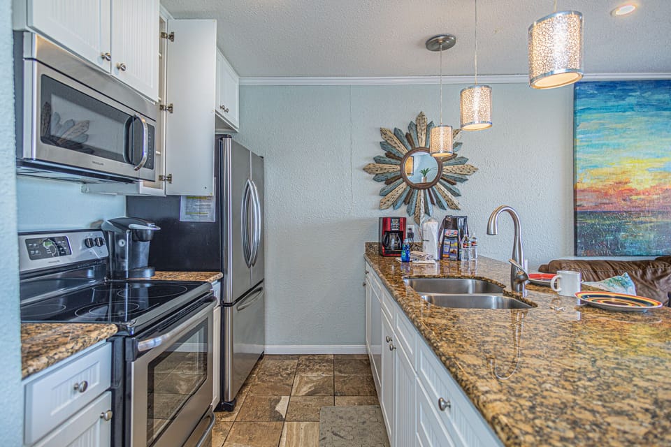 Granite Counter Tops and Stainless Steel Appliances.