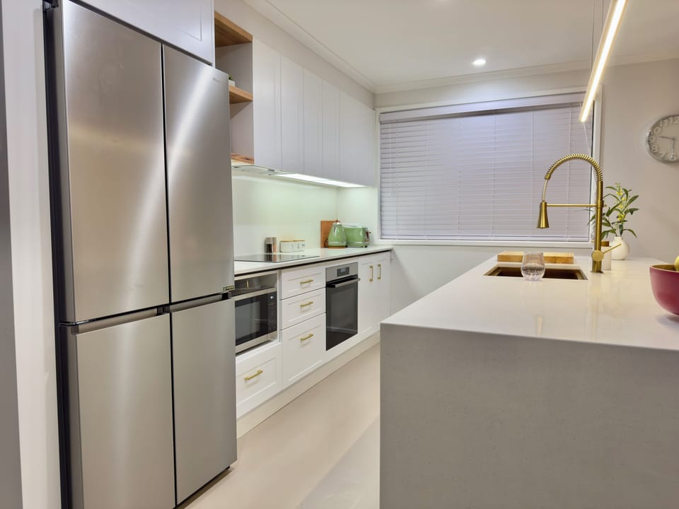 Big fridge, convection microwave, induction cooktop, oven and small appliances