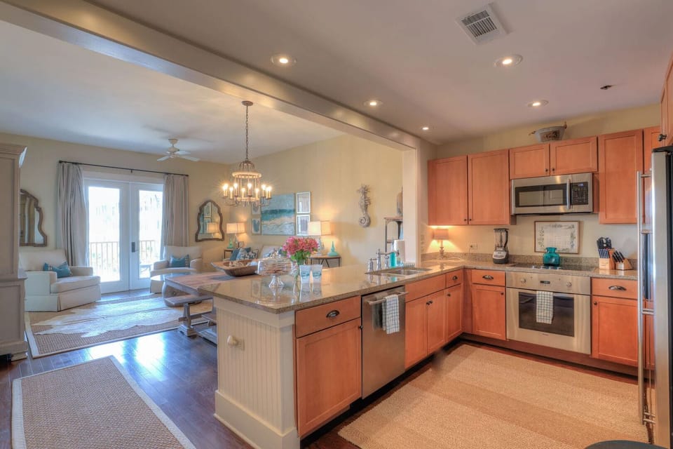 Step into the kitchen, where modern appliances and ample counter space make cooking and entertaining a breeze.