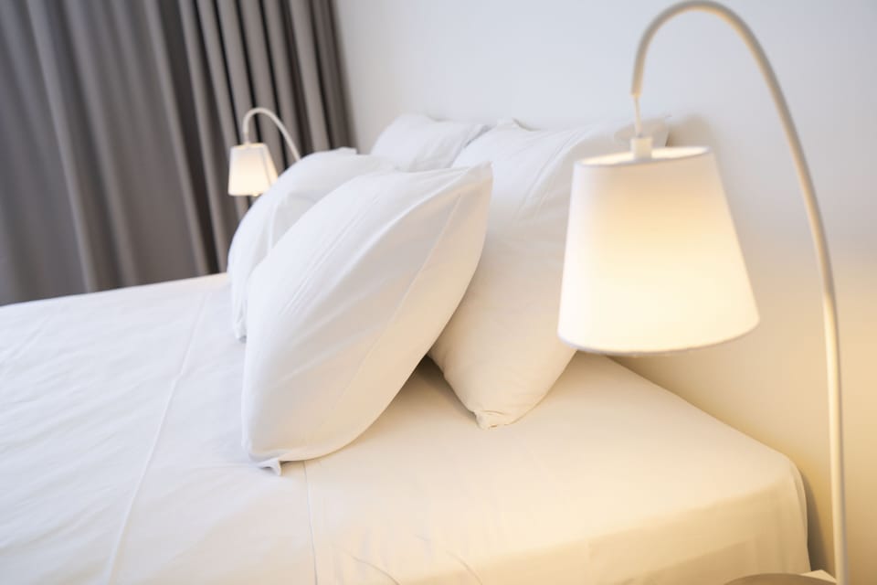 1 Bedroom Harbour View | Premium bedding, laptop workspace, blackout drapes, soundproofing