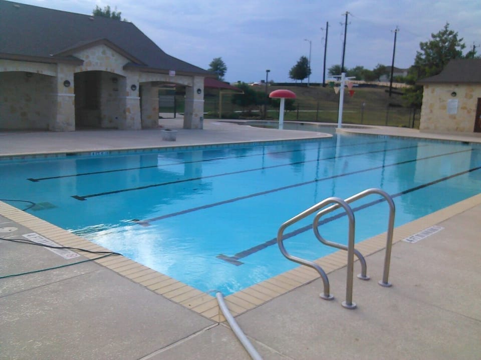 2 Community pools~1 Olympic size pool for the Adults & smaller Tot Play land