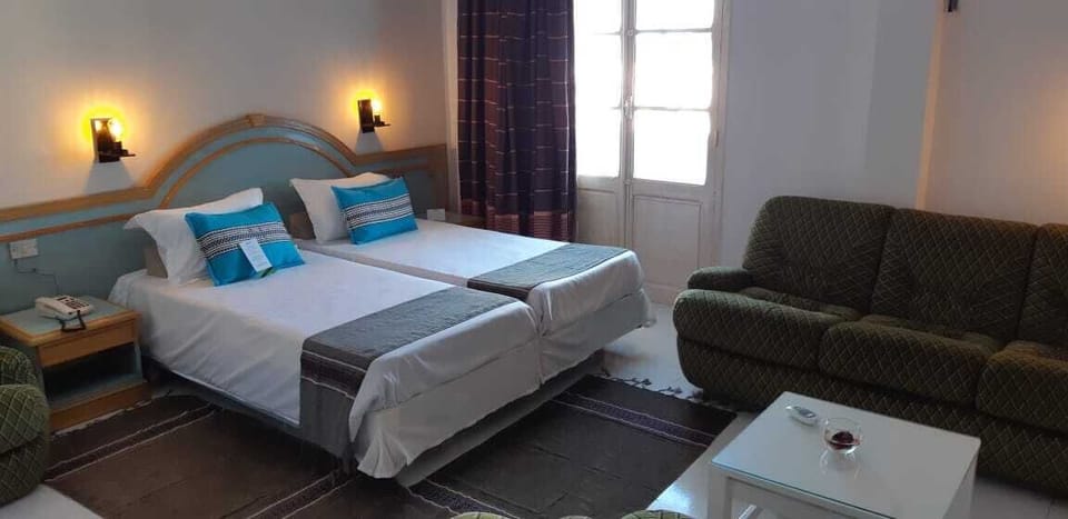 Double Room | Desk, blackout drapes, iron/ironing board, free cribs/infant beds