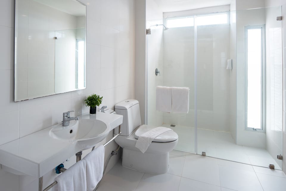 Shower, slippers, bidet, towels