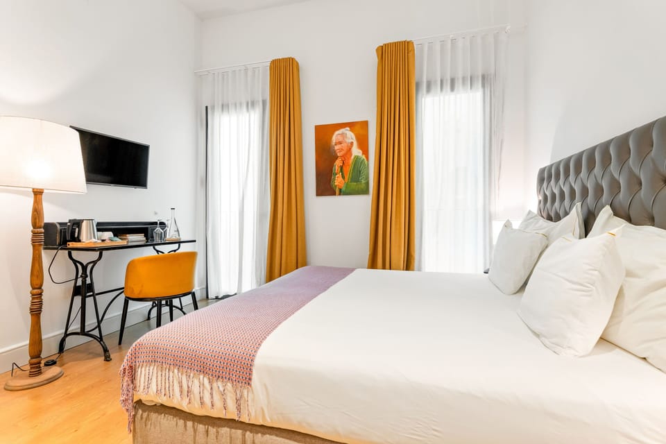 Superior Double or Twin Room | Minibar, in-room safe, desk, blackout drapes