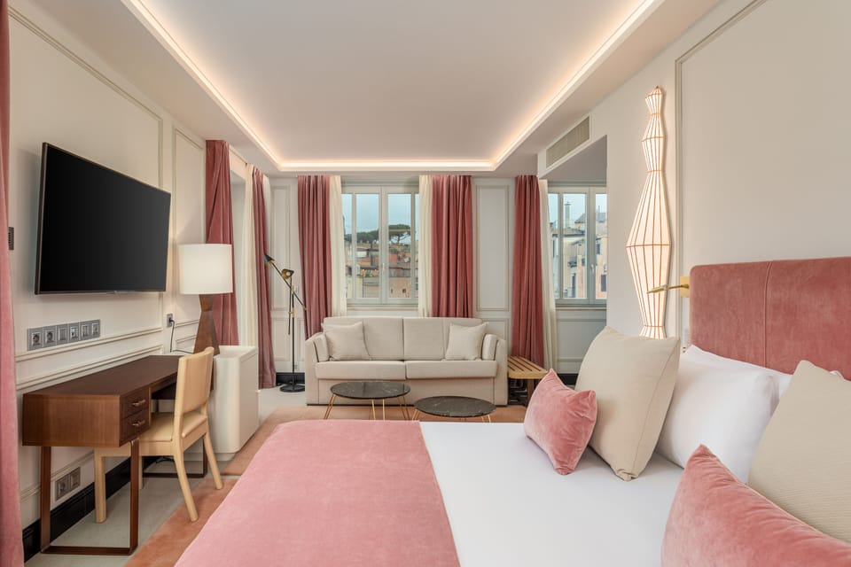 Junior Suite, Terrace | Minibar, in-room safe, desk, laptop workspace