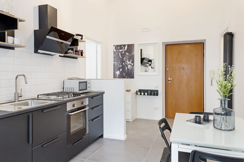 Apartment, 2 Bedrooms | Private kitchen | Full-size fridge, microwave, oven, stovetop
