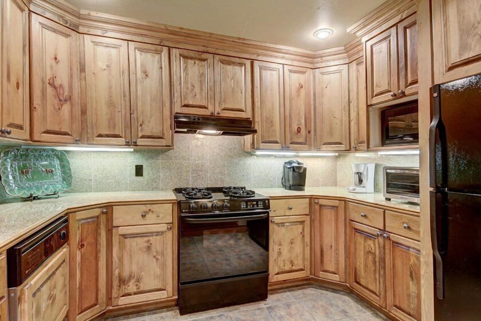 Condo, 2 Bedrooms | Private kitchen | Fridge, microwave, oven, dishwasher
