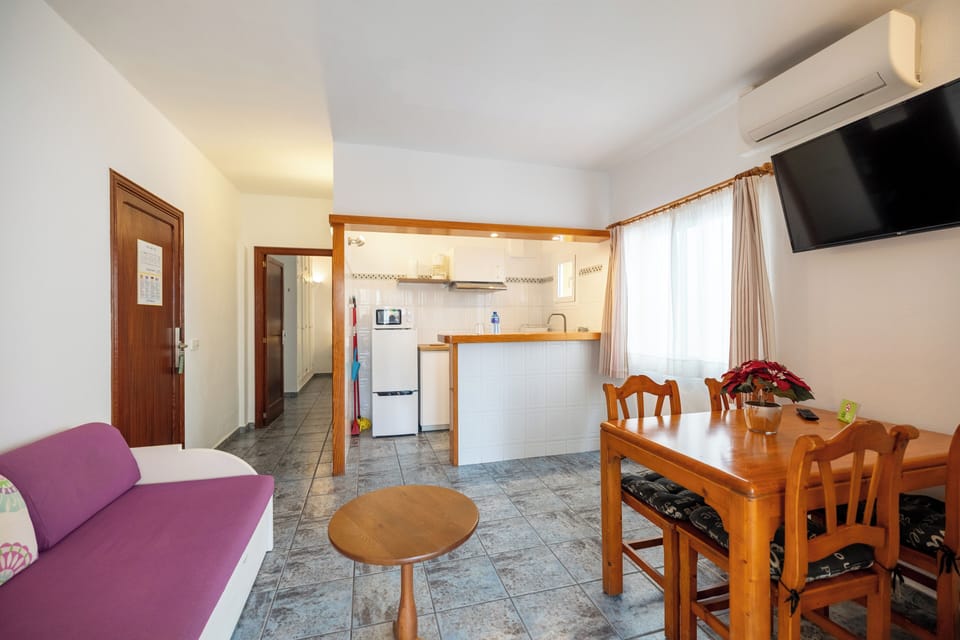 Superior Suite, 1 Bedroom | Minibar, desk, laptop workspace, iron/ironing board