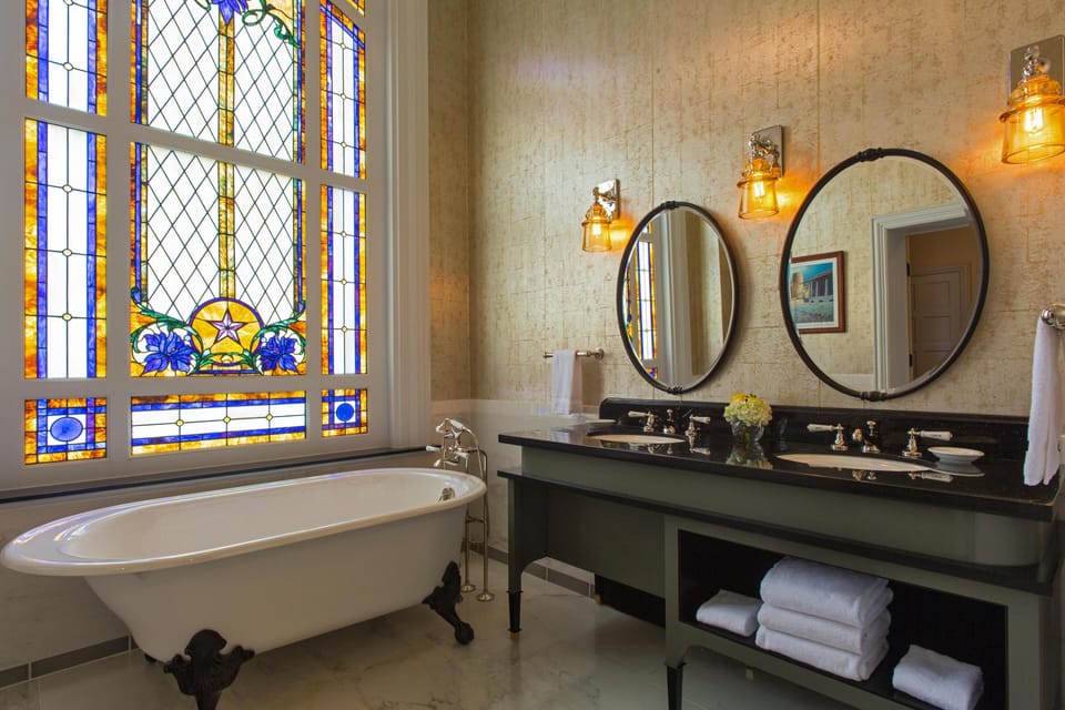 Combined shower/tub, designer toiletries, hair dryer, bathrobes