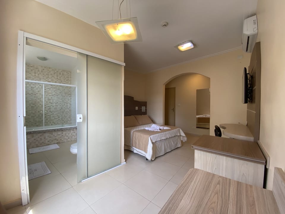 Studio Suite | Bathroom | Designer toiletries, hair dryer, towels