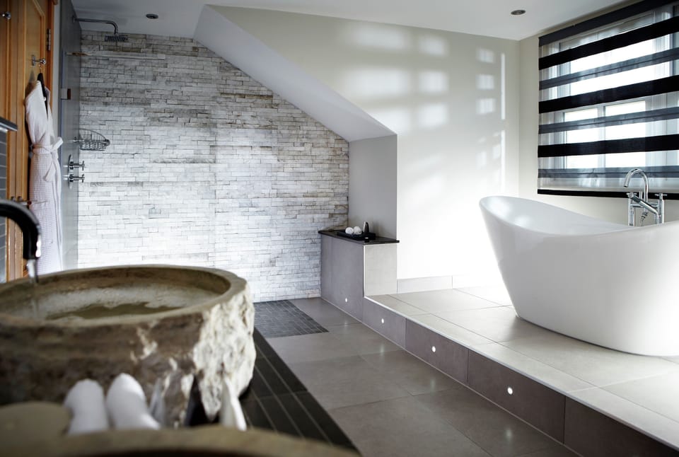 Spa Suite | Bathroom | Shower, designer toiletries, hair dryer, bathrobes