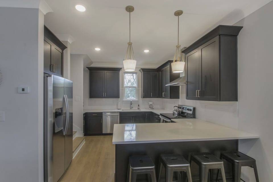 Fully equipped kitchen with bar area for 4  - dining table for 6 next to kitchen