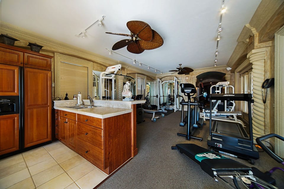 No need to find a local gym — the private fitness room is fully equipped and ready whenever you are, with a kitchenette right around the corner.