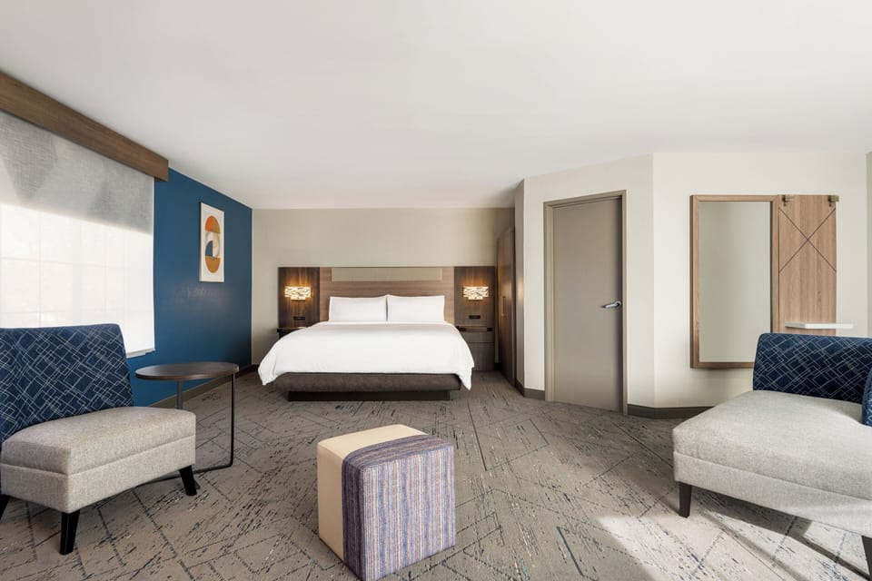 Suite, 1 King Bed, Mobility Accessible (Communications) | Desk, iron/ironing board, free cribs/infant beds, free WiFi