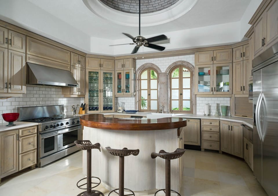 Whip up a culinary masterpiece in Villa Buena Vida's spectacular gourmet kitchen with professional stainless steel appliances!