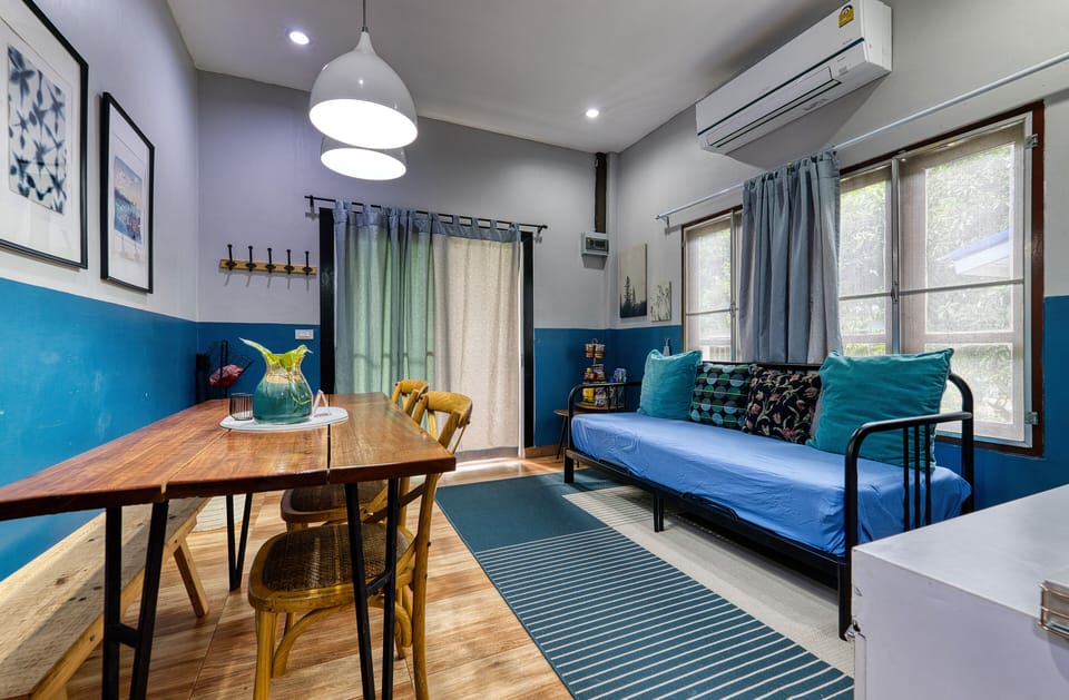 Bungalow, 2 Bedrooms, Garden View | Living area | 50-inch flat-screen TV with digital channels, LED TV, Netflix