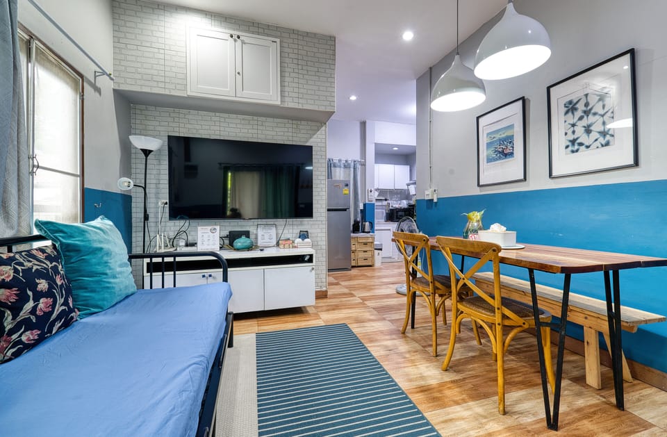 Bungalow, 2 Bedrooms, Garden View | Living area | 50-inch flat-screen TV with digital channels, LED TV, Netflix
