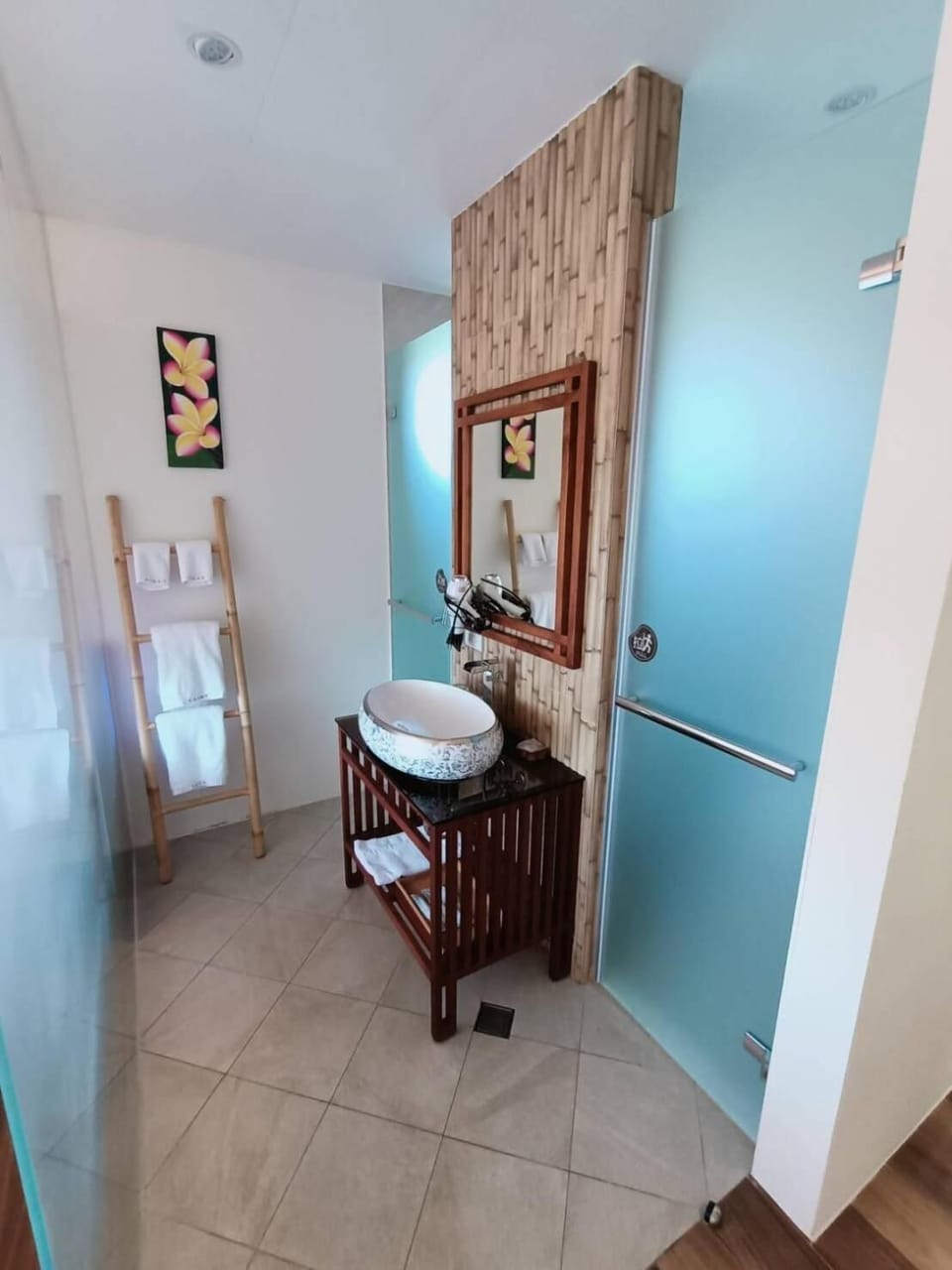 Shower, free toiletries, hair dryer, slippers