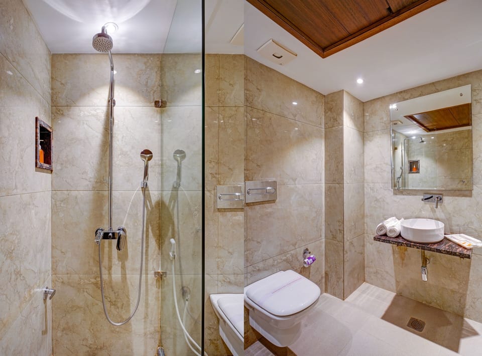 Shower, rainfall showerhead, designer toiletries, hair dryer